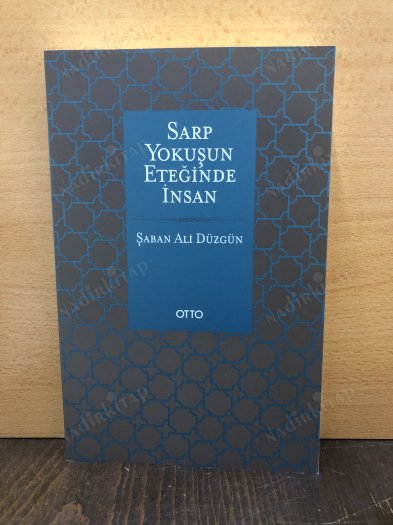Sarp Yokuşun Eteğinde İnsan kapağı