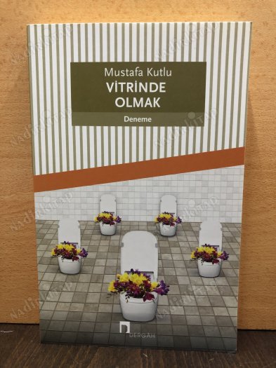 Vitrinde Olmak kapağı