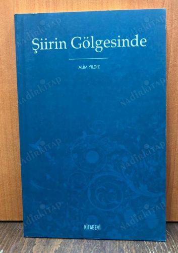 ŞİİRİN GÖLGESİNDE kapağı